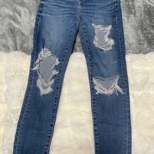 Distressed Blue Denim Jeans